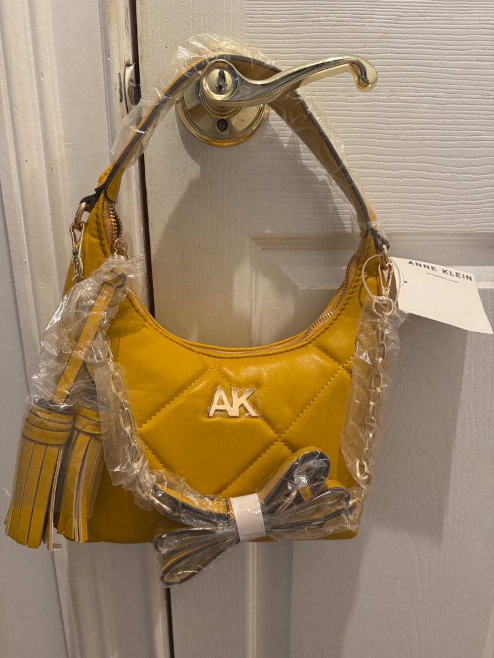 Anne Klein Quilted Mini Hobo Bag in Mustard Yellow with Tassel